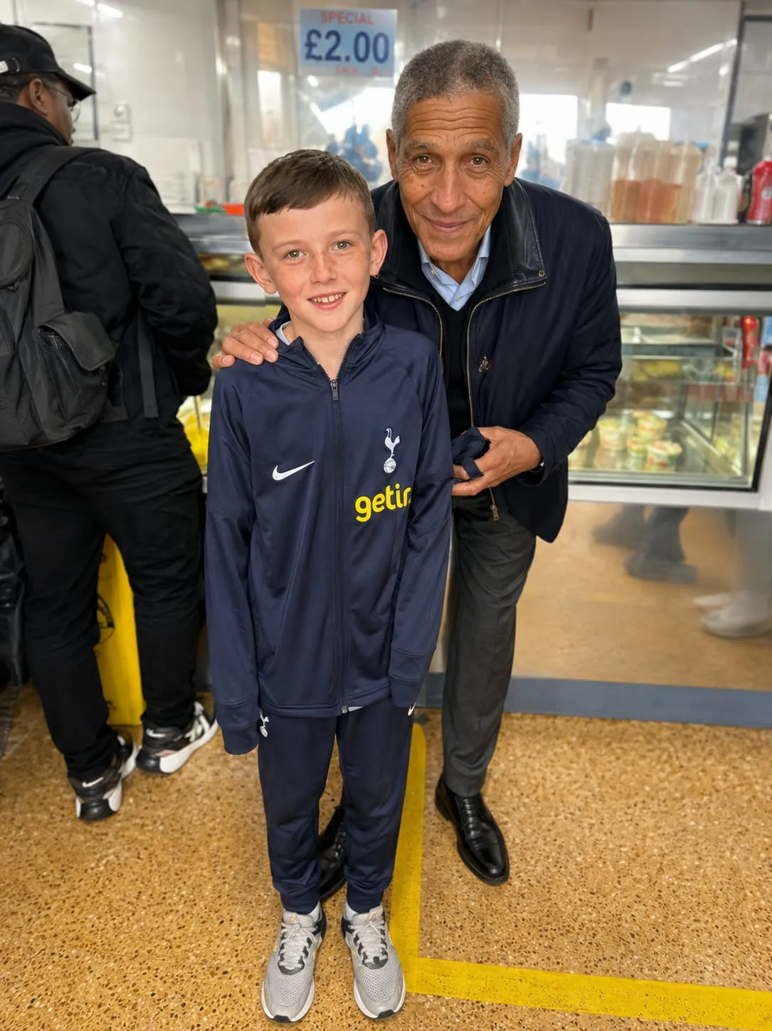A young customer in a Tottenham tracksuit at the Chick King counter